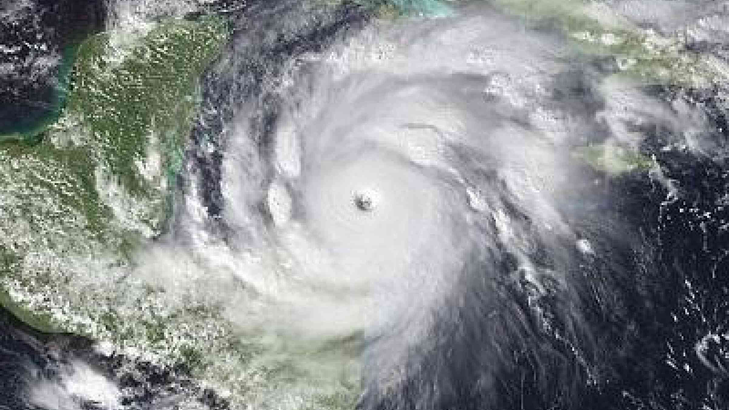 Hurricane Mitch at peak intensity on October 26, 1998 at 19:15 UTC. At the time, it was a Category 5 hurricane. (Credit: NOAA/NASA Satellite image)